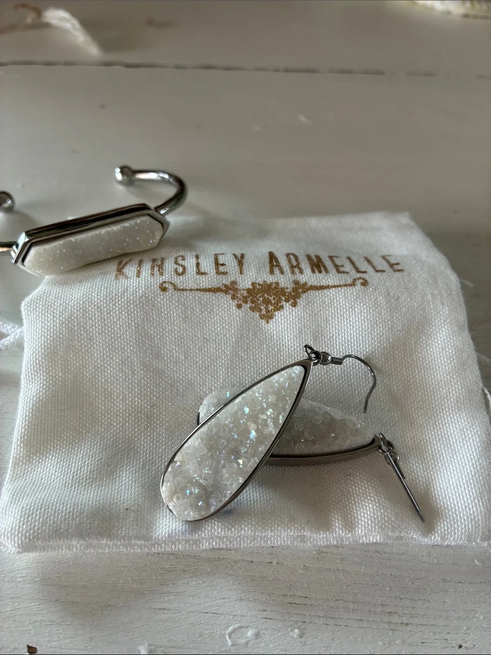Kinsley Armelle White Druzy Teardrop Earrings and matching silver tone bracelet